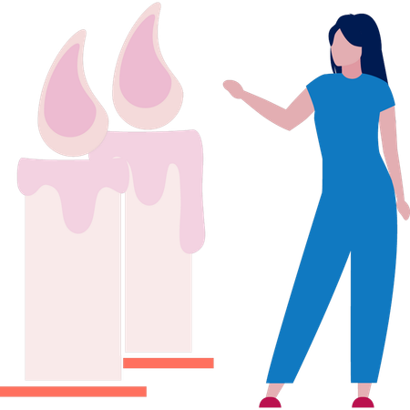 Une jeune femme pointe une bougie allumée  Illustration